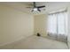 Large bedroom with a ceiling fan and a window with curtains at 4276 Santolina Way # A, Murrells Inlet, SC 29576