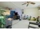 Spacious living room with ceiling fan and bright interior and view of kitchen in background at 4276 Santolina Way # A, Murrells Inlet, SC 29576