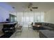 Bright and airy living room with large windows, comfortable sofa, and minimalist decor at 4276 Santolina Way # A, Murrells Inlet, SC 29576