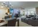 Open-concept living space with a dining area, comfortable seating, and lots of natural light at 4276 Santolina Way # A, Murrells Inlet, SC 29576
