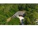 Aerial view of the large brick home surrounded by lush trees and expansive yard at 4363 Parkland Dr., Myrtle Beach, SC 29579