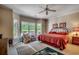 Spacious bedroom with hardwood floors, large windows and comfortable seating area at 4363 Parkland Dr., Myrtle Beach, SC 29579