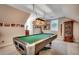 Bonus room featuring a vintage pool table, complimented by a vintage light fixture at 4363 Parkland Dr., Myrtle Beach, SC 29579