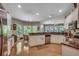 Bright kitchen featuring granite countertops, stainless steel appliances, hardwood floors and bay windows at 4363 Parkland Dr., Myrtle Beach, SC 29579