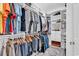 Walk-in closet with custom shelving and ample storage space for clothes and accessories at 442 Mahogany Dr. # 101, Murrells Inlet, SC 29576