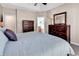 Spacious main bedroom featuring soft lighting, neutral colors, plush carpeting, and ample closet space at 442 Mahogany Dr. # 101, Murrells Inlet, SC 29576
