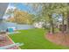 The big backyard has a luscious green lawn and a privacy fence at 460 Boundary Ave. # A & B, Murrells Inlet, SC 29576