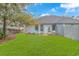 Spacious backyard with green lawn and patio sitting area perfect for outdoor entertaining at 460 Boundary Ave. # A & B, Murrells Inlet, SC 29576