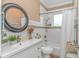 Well-lit bathroom with a tub and subway tiled shower at 460 Boundary Ave. # A & B, Murrells Inlet, SC 29576