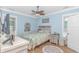 Cozy bedroom with ceiling fan, hardwood floors, and stylish decor at 460 Boundary Ave. # A & B, Murrells Inlet, SC 29576