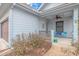 Cozy front porch with seating and a ceiling fan, offering a welcoming entrance to the home at 460 Boundary Ave. # A & B, Murrells Inlet, SC 29576