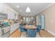 Spacious open-concept kitchen flowing into a living area, featuring modern appliances and stylish decor at 460 Boundary Ave. # A & B, Murrells Inlet, SC 29576