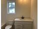Bathroom featuring new vanity, modern black faucet and a window at 4762 Huckleberry Ln., Conway, SC 29526