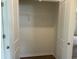 A well-lit walk-in closet with shelving for ample storage space at 4762 Huckleberry Ln., Conway, SC 29526