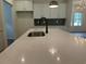 A closer view of the quartz countertop and stainless steel appliances at 4762 Huckleberry Ln., Conway, SC 29526