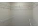 Unfinished walk-in closet with wire shelving, offering lots of storage and customization options at 4762 Huckleberry Ln., Conway, SC 29526