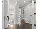 Upstairs hallway with hardwood floors and pendant lighting at 4862 Mill Pond Rd., Myrtle Beach, SC 29588