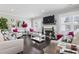 Inviting living room with elegant decor, fireplace, large windows, and stylish furnishings at 4862 Mill Pond Rd., Myrtle Beach, SC 29588