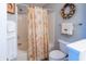 Cozy bathroom with charming seashell accents and a shower/tub combination at 5000 Windsor Green Way # 102, Myrtle Beach, SC 29579