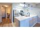 Modern kitchen featuring white cabinets, stainless steel appliances and stylish pendant lighting at 5000 Windsor Green Way # 102, Myrtle Beach, SC 29579