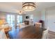 Open floorplan connects the dining area and living room with sliding door to outside at 5000 Windsor Green Way # 102, Myrtle Beach, SC 29579