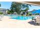 Sparkling community pool area with ample seating, perfect for relaxation and recreation at 5000 Windsor Green Way # 102, Myrtle Beach, SC 29579