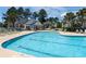 Inviting community pool offering a relaxing atmosphere with surrounding amenities at 5000 Windsor Green Way # 102, Myrtle Beach, SC 29579