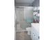 A tidy bathroom featuring a shower/tub combination, a white vanity, and a framed glass shower door at 501 44Th Ave. N # D 9, Myrtle Beach, SC 29577