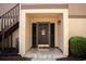 Inviting front entryway with a decorative 'welcome' door and tiled flooring, creating a warm first impression at 501 44Th Ave. N # D 9, Myrtle Beach, SC 29577