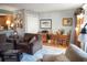 Inviting living room showcasing comfortable seating, hardwood flooring, a dining area, and natural light at 501 44Th Ave. N # D 9, Myrtle Beach, SC 29577