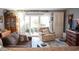 Cozy living room with sliding glass doors to an outdoor patio, featuring comfortable seating and natural light at 501 44Th Ave. N # D 9, Myrtle Beach, SC 29577