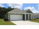 Attractive home with a two-car garage and classic curb appeal at 519 Blissful Ln., Little River, SC 29566