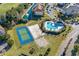 Aerial view of community amenities including a pool, tennis court, and common areas at 5801 Oyster Catcher Dr. # 1214, North Myrtle Beach, SC 29582