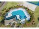 Aerial view of community pool and surrounding lounge area with chairs at 5801 Oyster Catcher Dr. # 1214, North Myrtle Beach, SC 29582