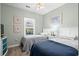 Inviting bedroom with two twin beds, soft lighting, and tasteful decor creates a relaxing atmosphere at 5801 Oyster Catcher Dr. # 1214, North Myrtle Beach, SC 29582