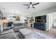 Spacious living area with an open floor plan, modern decor, and seamless flow to the kitchen and hallway at 5801 Oyster Catcher Dr. # 1214, North Myrtle Beach, SC 29582