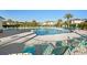 Outdoor pool area with lounge chairs and well-manicured landscaping at 5801 Oyster Catcher Dr. # 1214, North Myrtle Beach, SC 29582