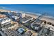 Stunning aerial perspective of the coastal community, beachfront condos, and the ocean's edge at 6000 N North Ocean Blvd. # 329, North Myrtle Beach, SC 29582