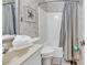 The bathroom features a shower, a vanity, and coastal decor at 6000 N North Ocean Blvd. # 329, North Myrtle Beach, SC 29582