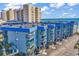 Coastal condo complex featuring private balconies with ocean views and on-site parking at 6000 N North Ocean Blvd. # 329, North Myrtle Beach, SC 29582
