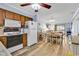Functional kitchen flows into the dining and living areas with stylish flooring and natural light at 6000 N North Ocean Blvd. # 329, North Myrtle Beach, SC 29582