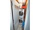 Convenient laundry closet featuring a stacked washer and dryer, maximizing space and efficiency at 6000 N North Ocean Blvd. # 329, North Myrtle Beach, SC 29582