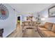 Inviting living room with comfortable seating and open floor plan to the kitchen at 6000 N North Ocean Blvd. # 329, North Myrtle Beach, SC 29582
