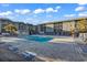 Large community pool with lounge chairs and well-maintained surrounding property at 6000 N North Ocean Blvd. # 329, North Myrtle Beach, SC 29582