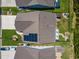 Aerial view of the home displaying the backyard layout, landscaping, and outdoor living spaces at 757 Cherry Blossom Dr., Murrells Inlet, SC 29576