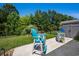 Beautifully landscaped backyard offers a peaceful retreat with stylish patio furniture and a well-maintained lawn at 757 Cherry Blossom Dr., Murrells Inlet, SC 29576