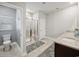 Clean and well-lit bathroom with a glass-enclosed shower and granite countertops at 757 Cherry Blossom Dr., Murrells Inlet, SC 29576