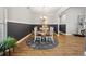 Elegant dining room with round table, stylish chairs, and modern decor at 757 Cherry Blossom Dr., Murrells Inlet, SC 29576