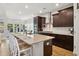 Charming kitchen with granite countertops, stainless steel appliances and ample counter space at 757 Cherry Blossom Dr., Murrells Inlet, SC 29576
