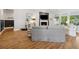 Cozy living room with modern decor, fireplace, and plenty of natural light at 757 Cherry Blossom Dr., Murrells Inlet, SC 29576